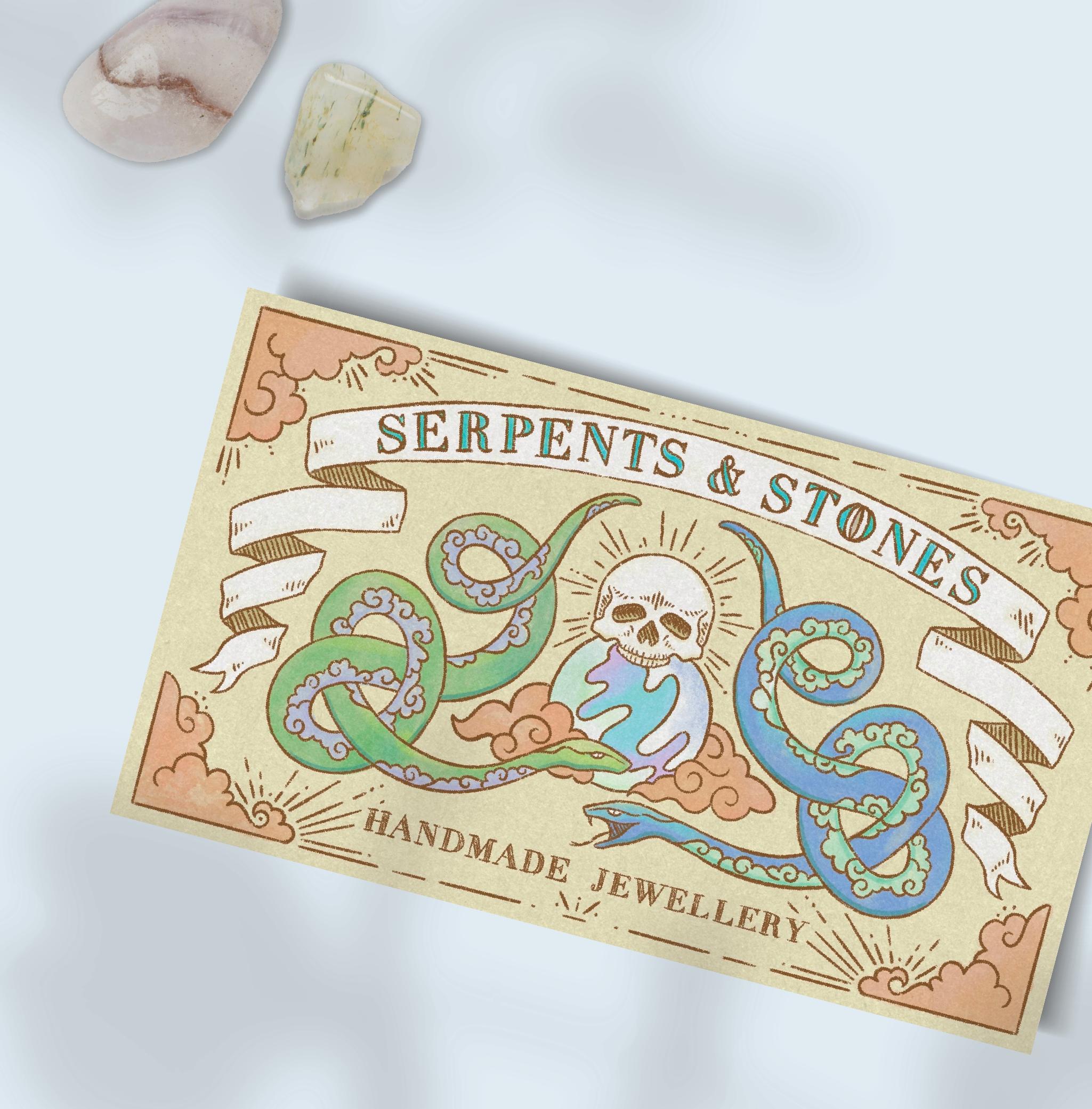 Business card with snakes and skull