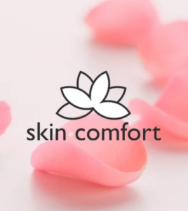 Skin Comfort logo on rose petal background